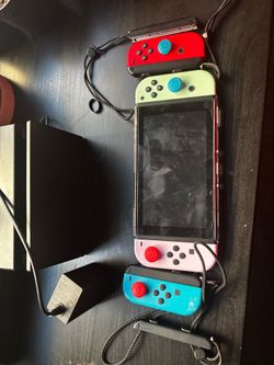 Nintendo switch with a extra pair of controllers
