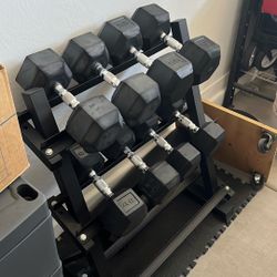 Dumbbell Set. Two Fifty Pound Dumbbells. Two Fifty Five Dumbbells. Two Forty Pound Dumbbells. Two Thirty Pound Dumbbells. Weight Rack. 