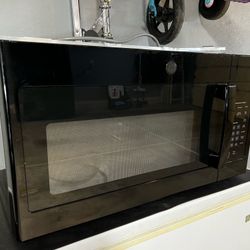 New GE Over-the-range Microwave 