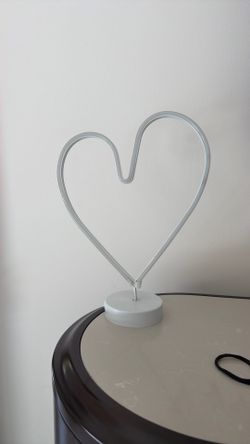 Neon heart shaped light