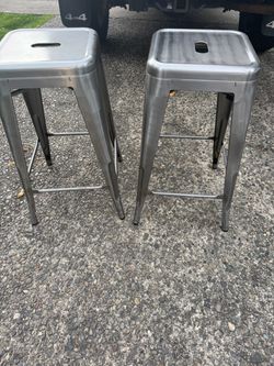 2 rustic metal bar stools