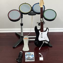 Rock Band 2 wii drum set with guitar and accessories