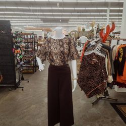 Female Headless White Plastic Mannequin- Bent Arm