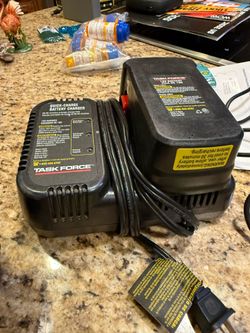 Task Force 18V quick-charge battery charger and battery, specifically model #29063.