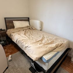 twin XL bed. INCLUDES mattress AND mattress topper. 