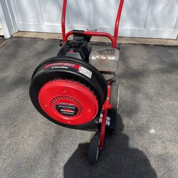 Troy Bilt Jet Sweep walk behind leaf blower. In good condition. Includes directional 