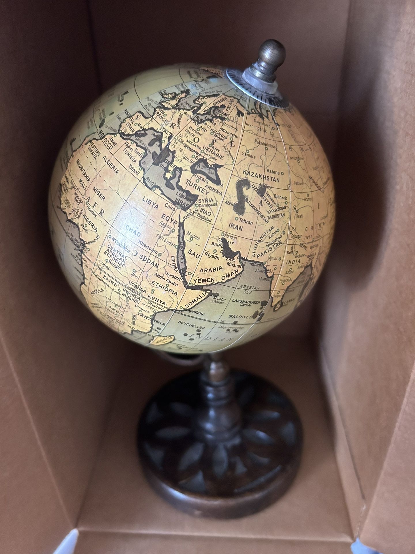 Smaller globe on base