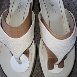 Vionic Women's Citrine Agave Vio-Motion Insole Toe-Post Sandal- Supportive Flat Dressy Sandals That Includes an Orthotic Insole and Cushioned Outsole 