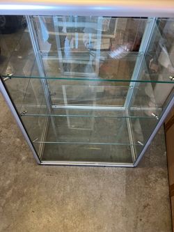 Business or Smoke Shop Glass Displays with 3 - Adjustable Shelves 26x10x18 it comes with a lock and two keys