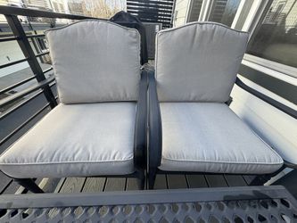 Hamilton Bay 4- Piece Black Metal Outdoor Patio with gray cushions.