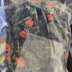Floral print backpack brand new never used retail price $24.99 I have 6 of them each one for $12