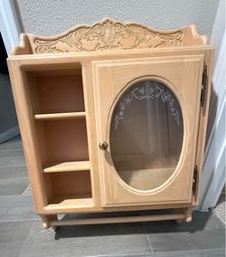 Wooden custom made cabinet with etched glass