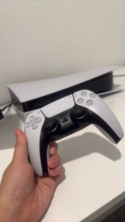 Ps5 with 1 white remote 1 all black remote