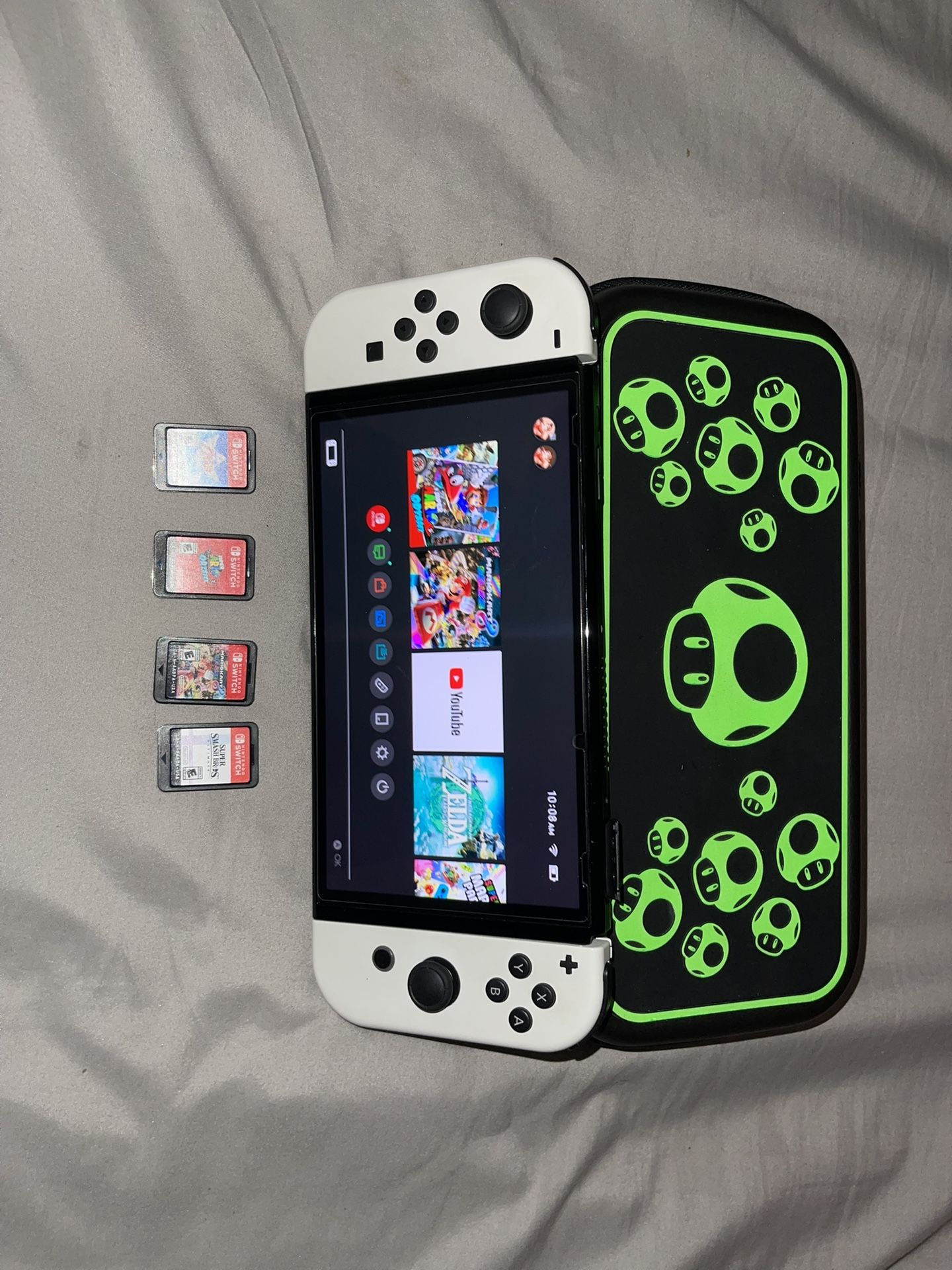 nintendi switch oled 4 games plus case no charger