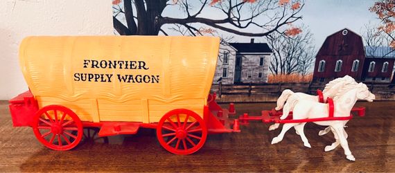 Two Plastic Western Conestoga Play Toys
