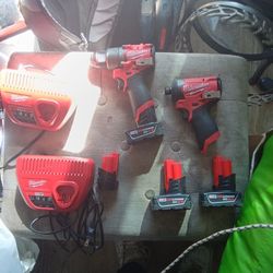 MILWAUKEE TOOlS, BATTERIES, And BATTERY CHARGERs. And TOOL BAG.