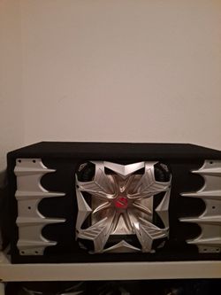 12-inch Kicker subwoofer and 2500-watt amplifier; everything works great