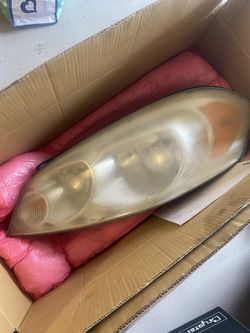 06 impala head lights in pairs