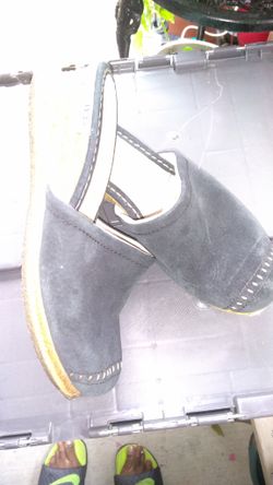 Black suede wedge heel mules by UGGS