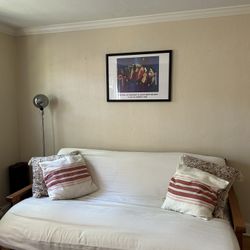 Wooden futon/pull out couch 