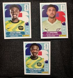 2026 FIFA World Cup Stickers Panini MOHAMED TOURE NESTORY IRANKUNDA CROCOMBE Max