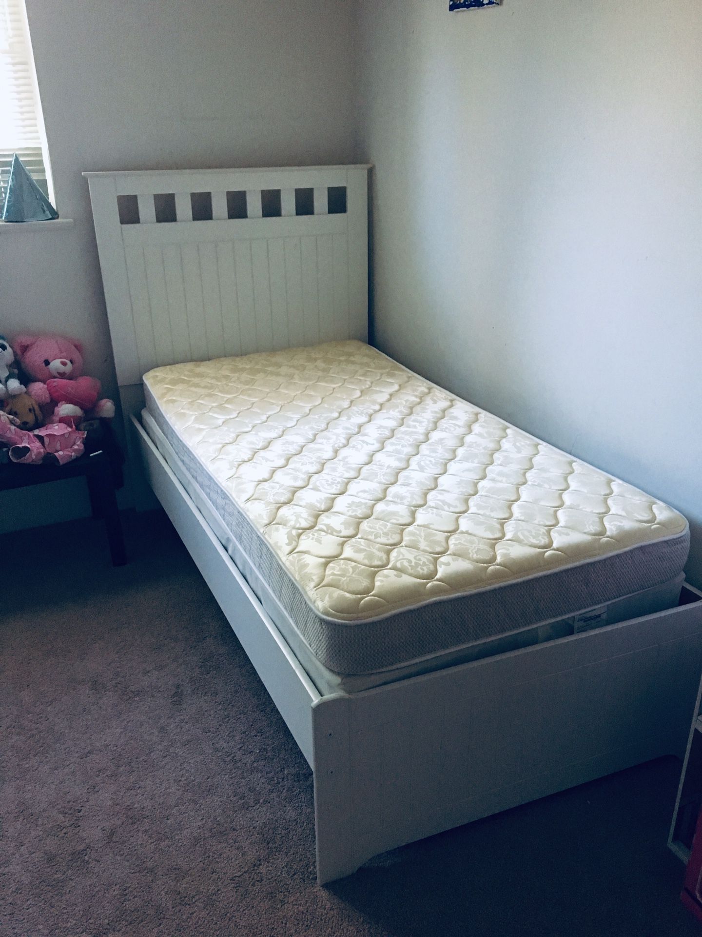 Twin bed with box spring and mattress