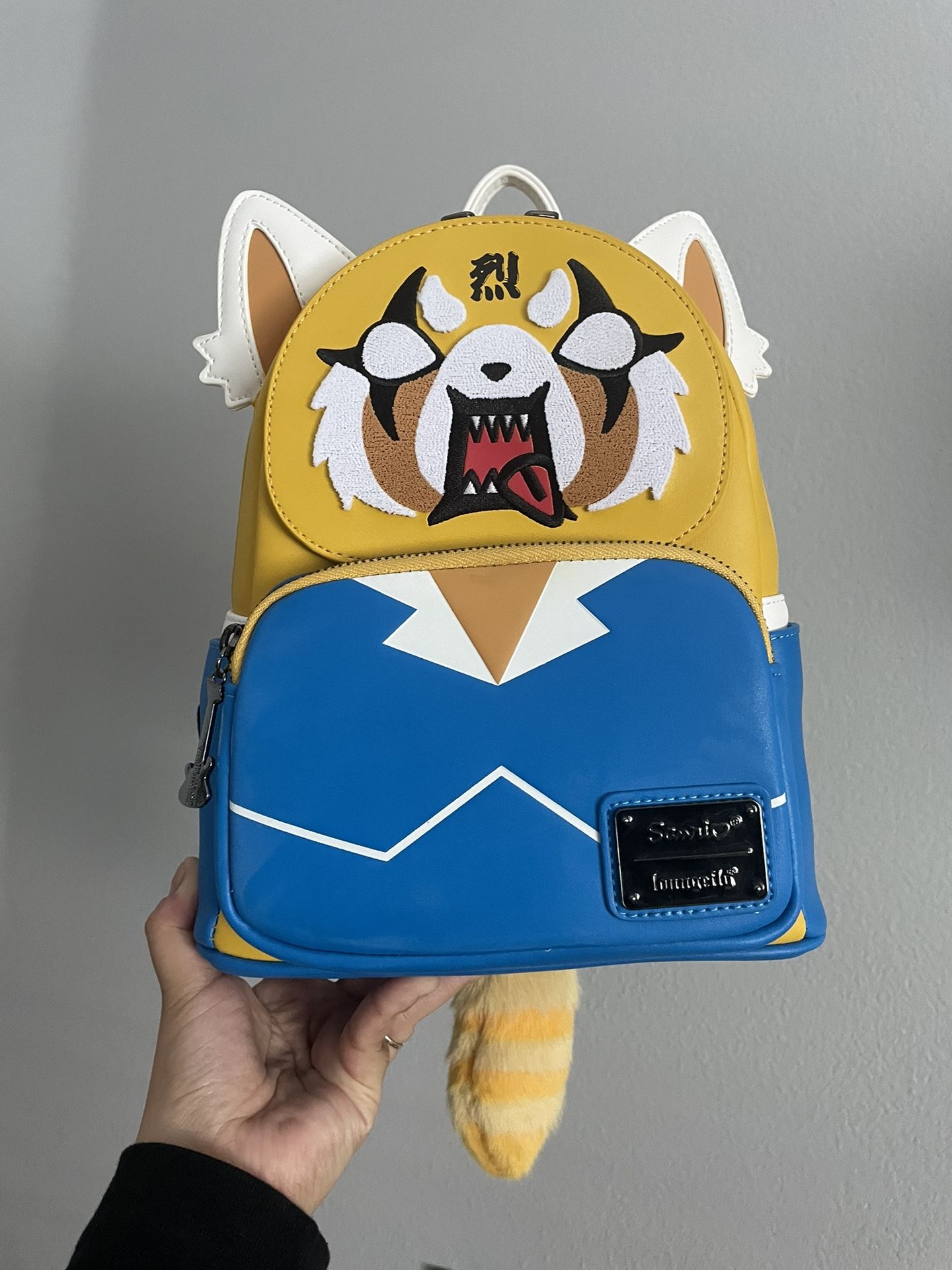 Loungefly Anime Sanrio Aggretsuko Two Face Cosplay Mini Backpack