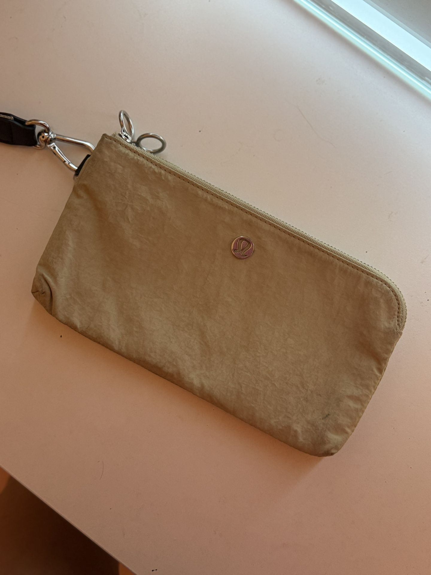 Beige LuLulemon wallet/wristlet