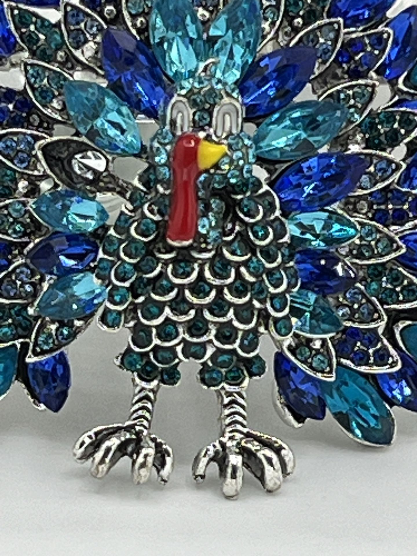 New In Box Women's Blue Crystal Rhinestone Roast Turkey Peacock Brooch Pin   Add a touch of elegance to your outfit with this stunning Women's Blue Cr