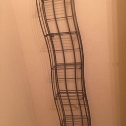 Folding metal shelf