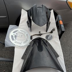 Ninja Kawasaki 300 parts sprockets,windshield, front fender, and shifter