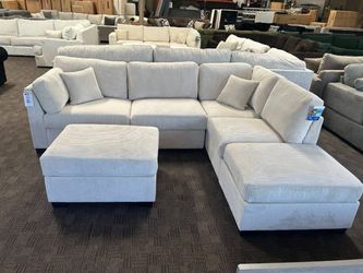 Reversible Beige corduroy sectional couch with ottoman