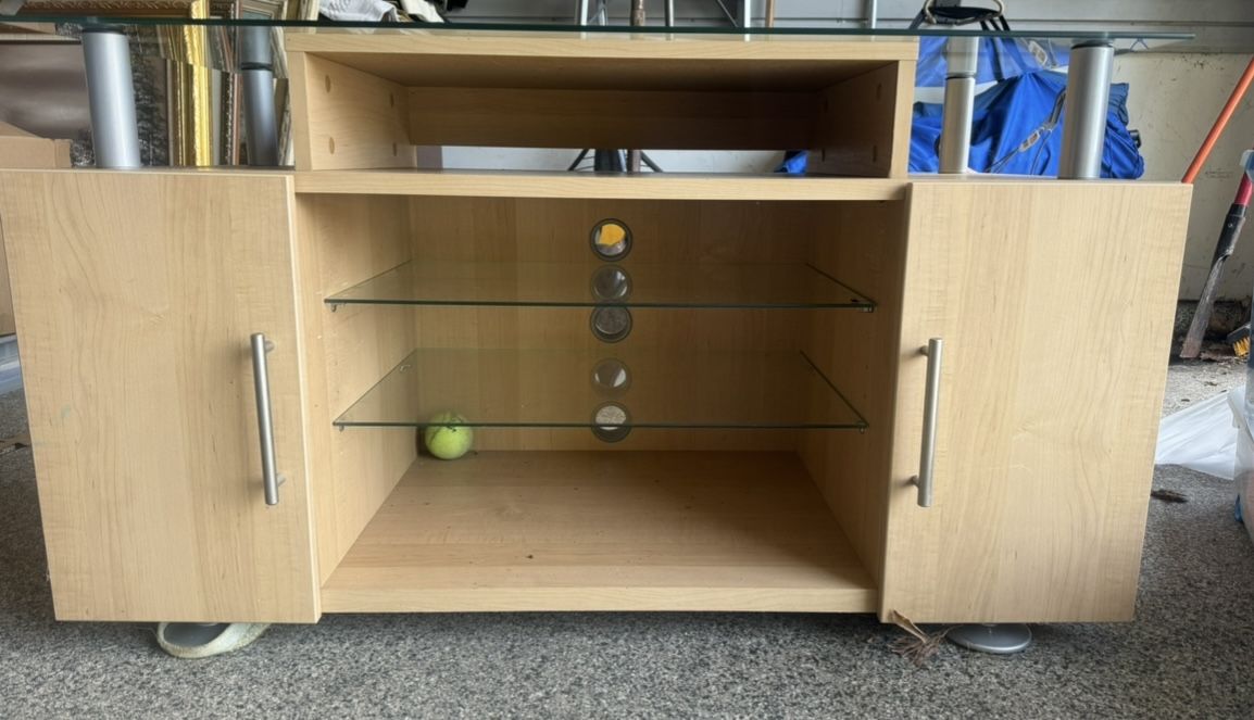 TV Stand With Glass Top And Cabinets.