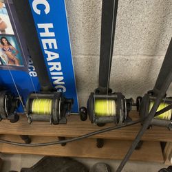 4 Trolling Reels And Custom Rods