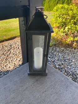 Outdoor lantern with candle