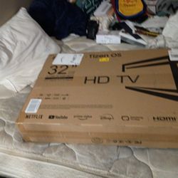 32"Flat Screen T.V. With A Built In DVD Player 