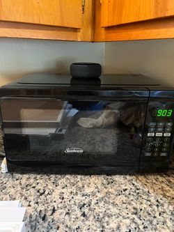 Small black microwave