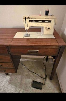 Singer Sewing Machine with Cabinet and Foot Pedal