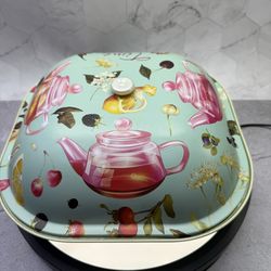 (1) Vintage style patterned metal tin container with a lid, often used for storage or as a decorative piece. with scalloped edges. floral pattern with
