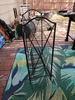 Record player stand with album storage.