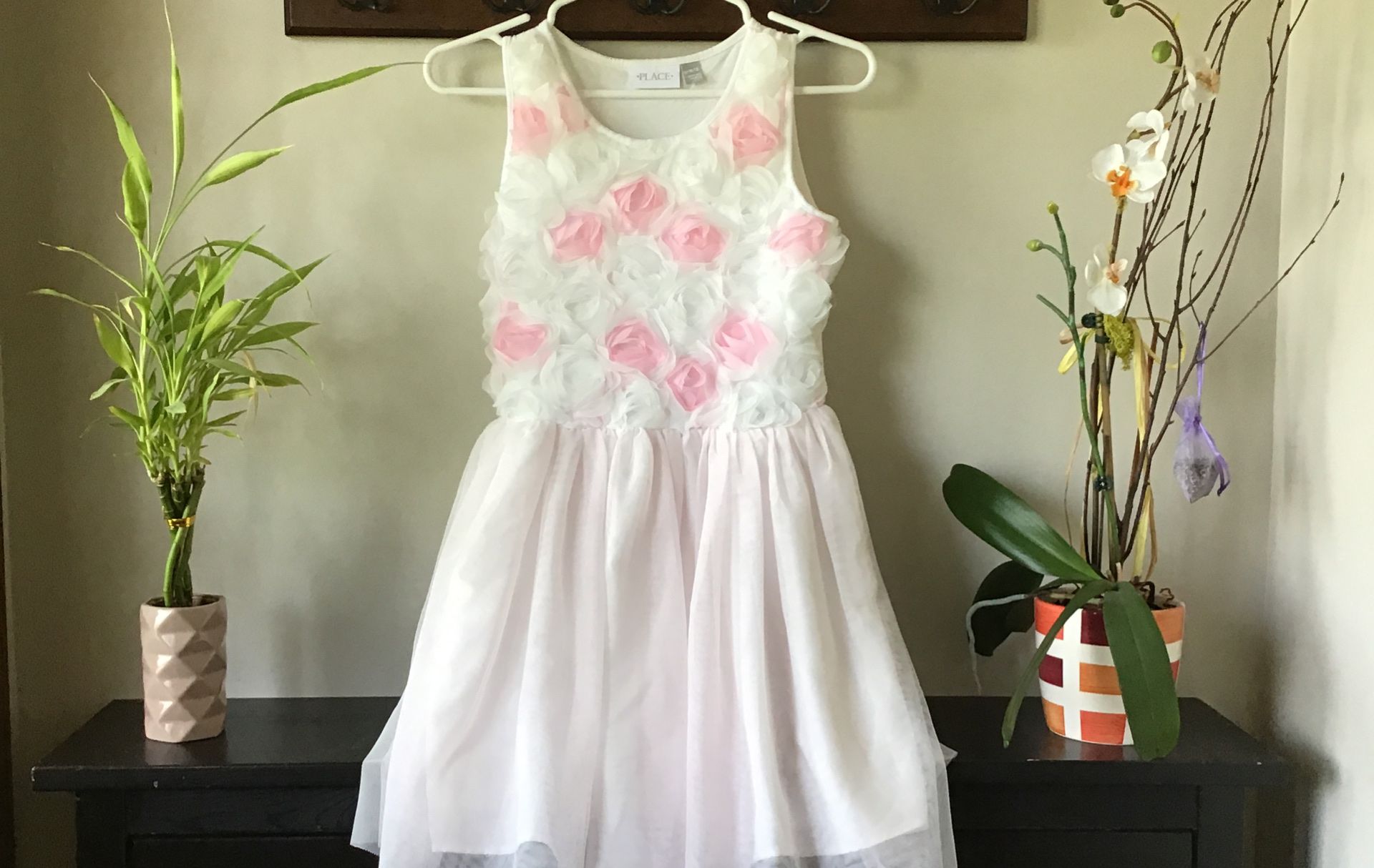 Girl white dress with flora flowers on top