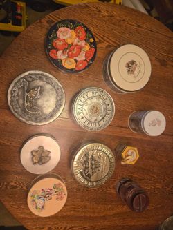 Vintage Tin Collection with Decorative Designs and Special Pewter Tops