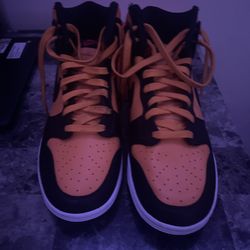 Yellow and black Jordans high