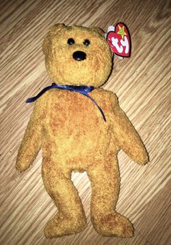 VINTAGE TY BEANIE BABY “FUZZ” IN PROTECTIVE CASE