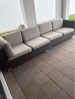 Outdoor sectional couch and table set