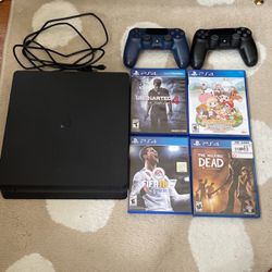 PlayStation 4 with Games And Controls