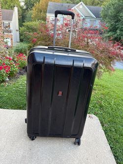 Large, 29” hard shell spinner luggage. Great quality and brand.