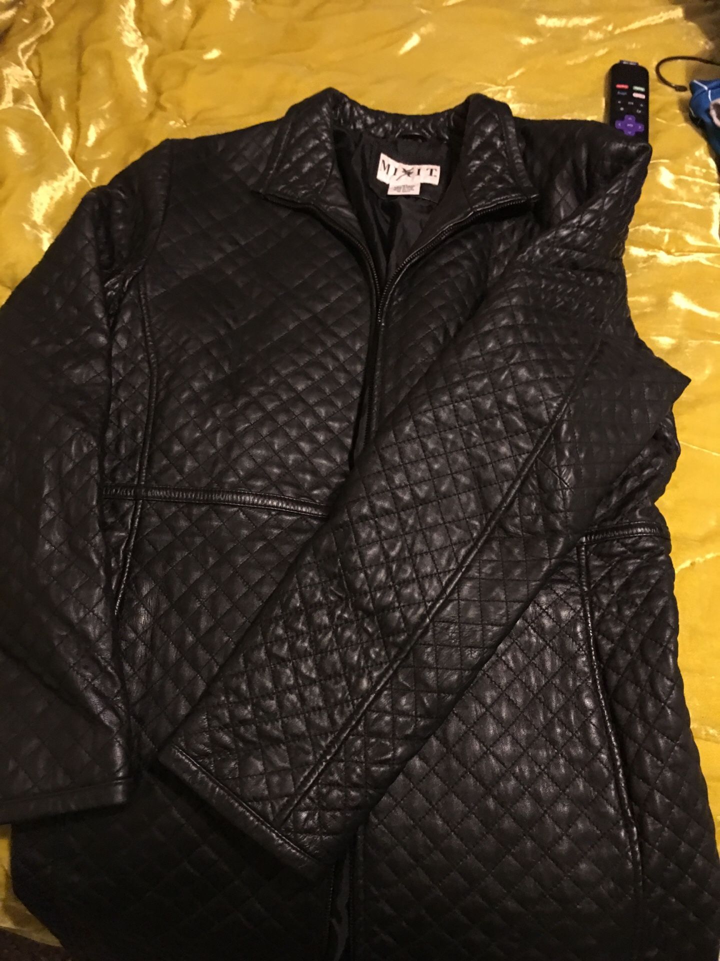 Black leather mid-length coat