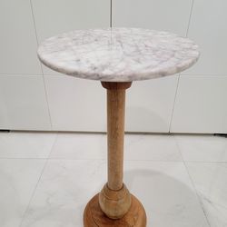 Bee & Willow Home Round Side Table - Natural Marble/White. Wooden and Marble Pedestal Table. This side table features a marble top and a mango wood pe