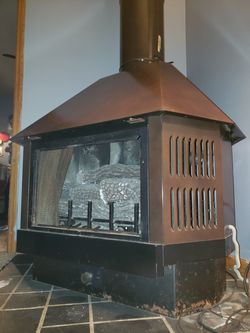 Old fireplace with gas insert